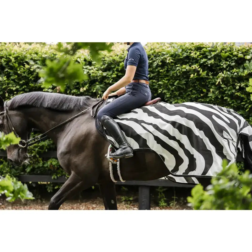 Black and white zebra-striped bucas buzz off riding fly rug with detachable neck for horse protection