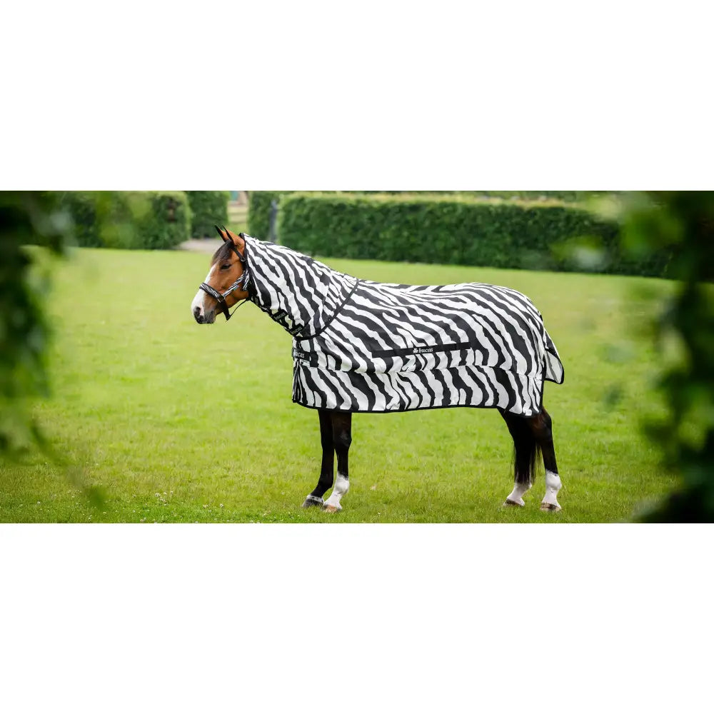 A bucas sweet itch black and white zebra fly rug with shoulder darts for a snug fit on horses and ponies