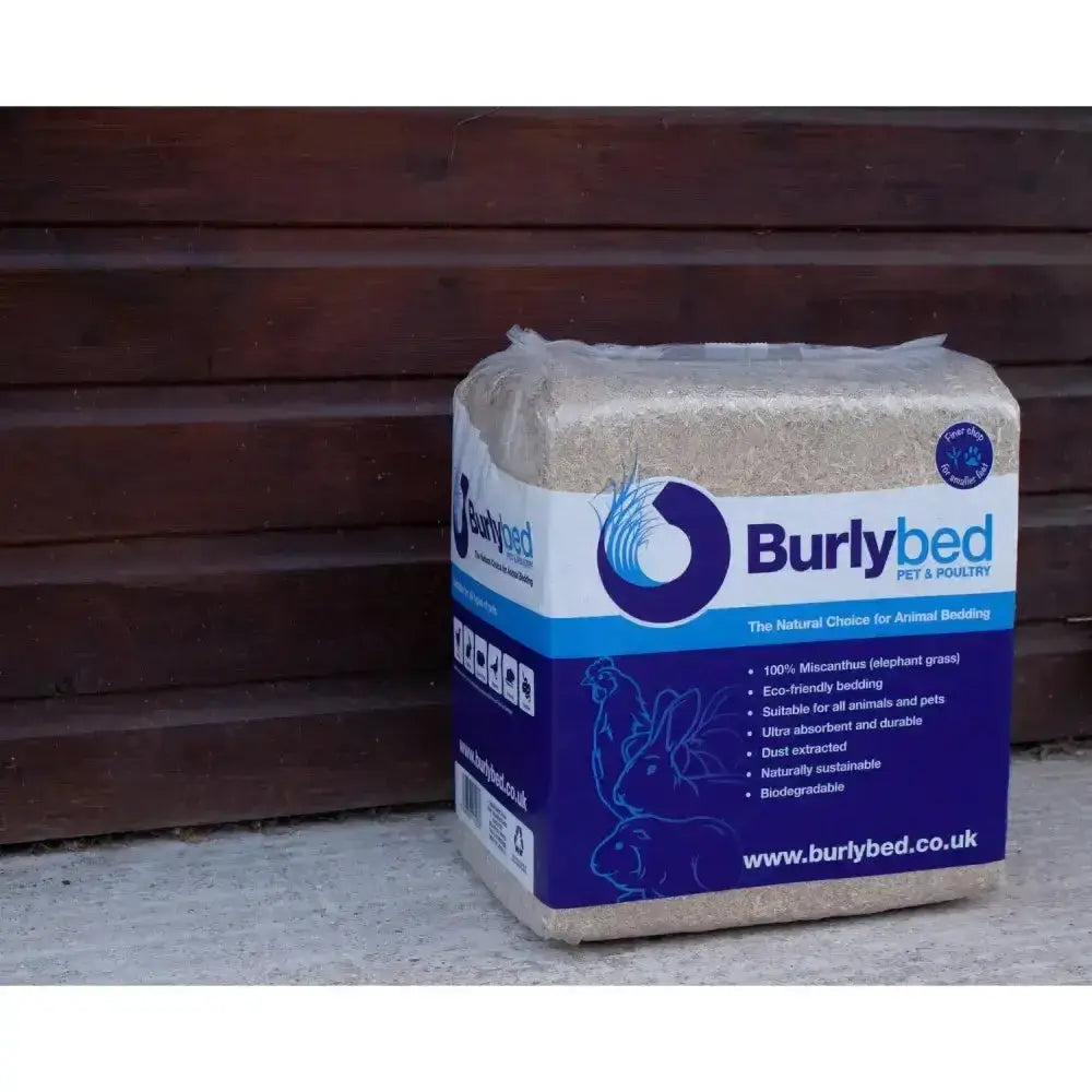 Burlybed pet and poultry bedding in white and blue package made from 100 percent miscanthus bedding material