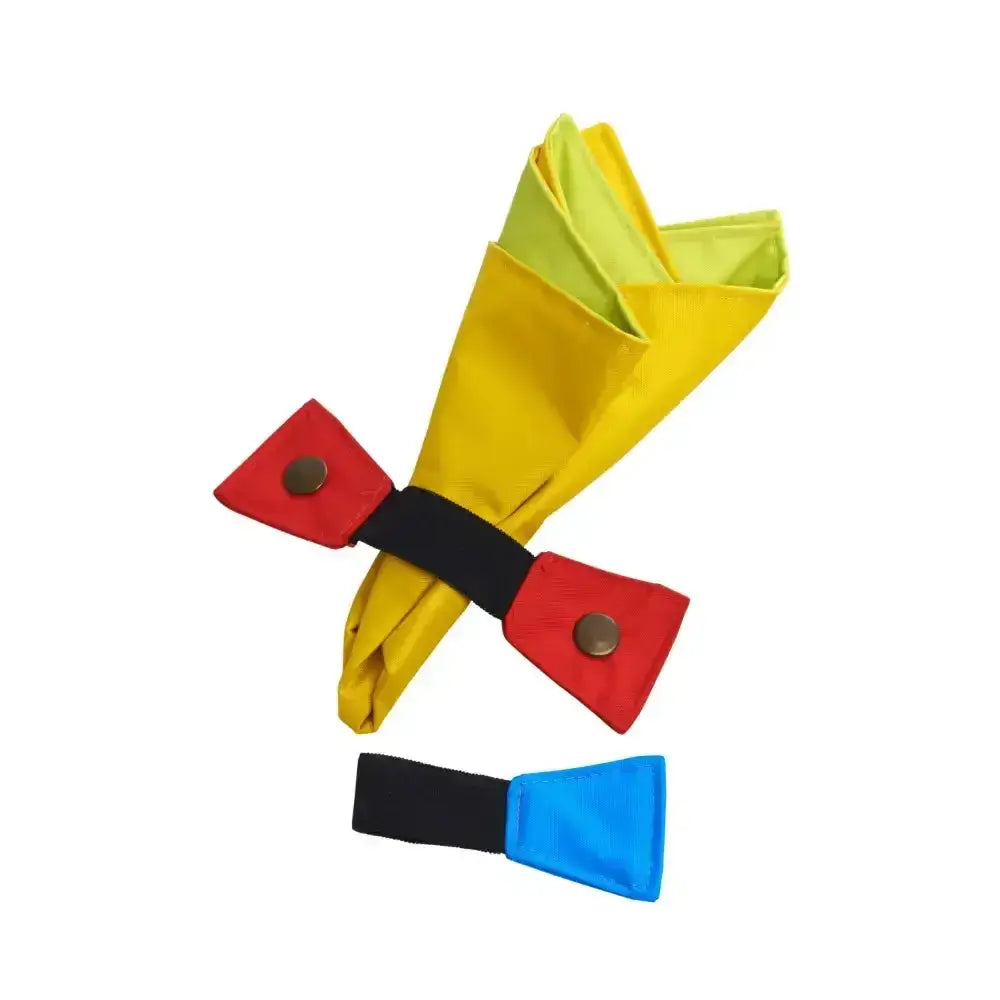 Bright yellow and lime green buster activity mat cloth with red black blue elastic band and metallic button closures