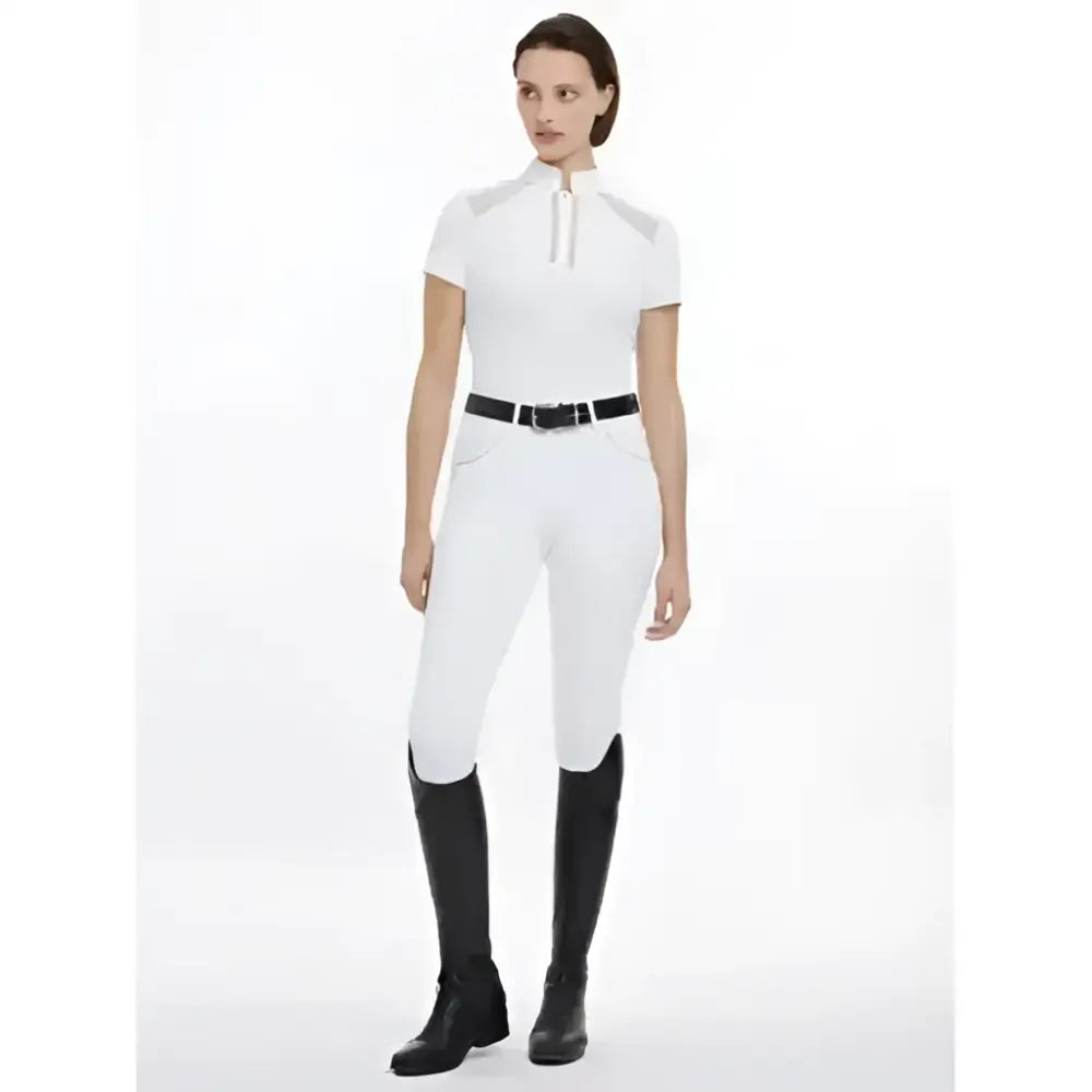 White camille short sleeve show shirt with high collar paired with black boots and belt for equestrian use