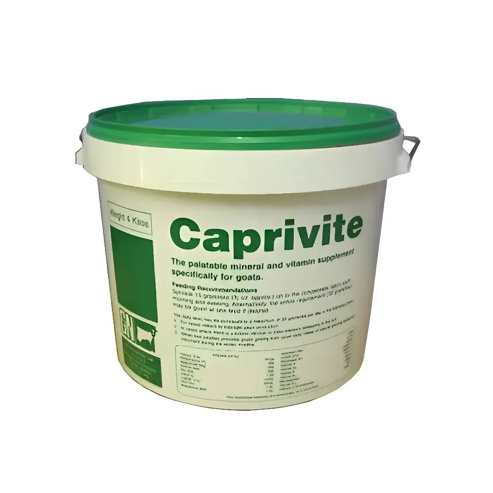White plastic bucket with green lid and handle labeled caprivite vitamin mineral feed with unique apple flavouring for goats