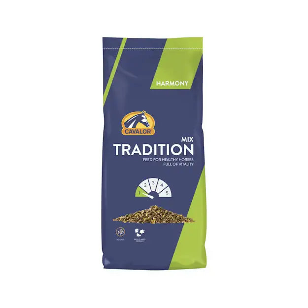 A navy and lime green bag of cavalor tradition mix horse feed featuring genetically modified soya 20 kg pack