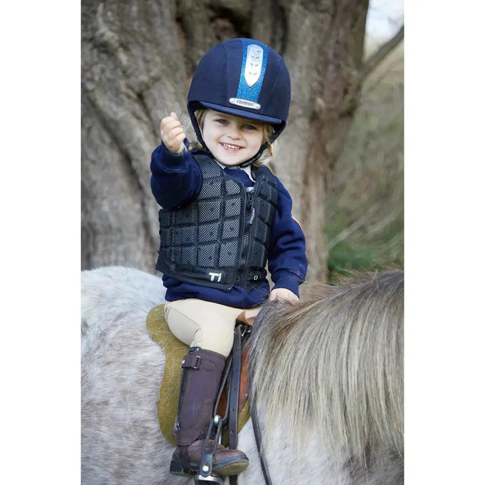 Navy blue champion titanium ti22 equestrian helmet with silver emblem for ti22 infant body protector use