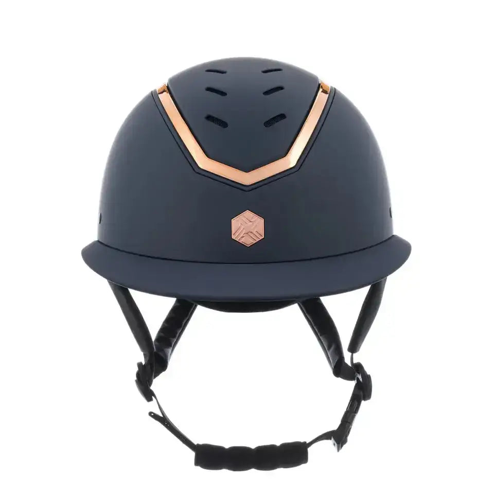 Navy blue charles owen eqx kylo mips riding helmet with rose gold accents and matching hexagonal logo for equestrian use