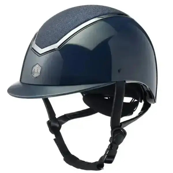 A sleek glossy dark blue charles owen eqx kylo riding helmet navy gloss with silver stripe and adjustable black straps