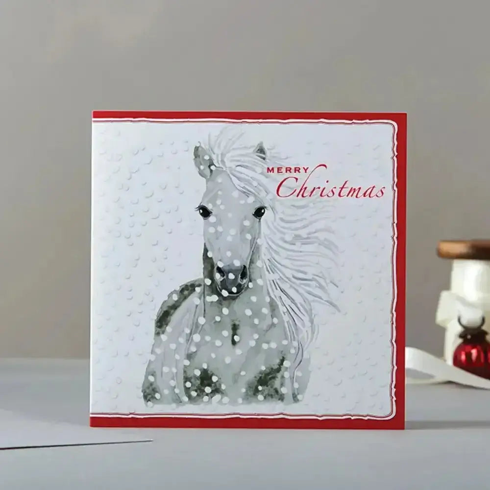A white christmas card rosa merry christmas with red border gray horse and snowflakes on eco kraft fleck material