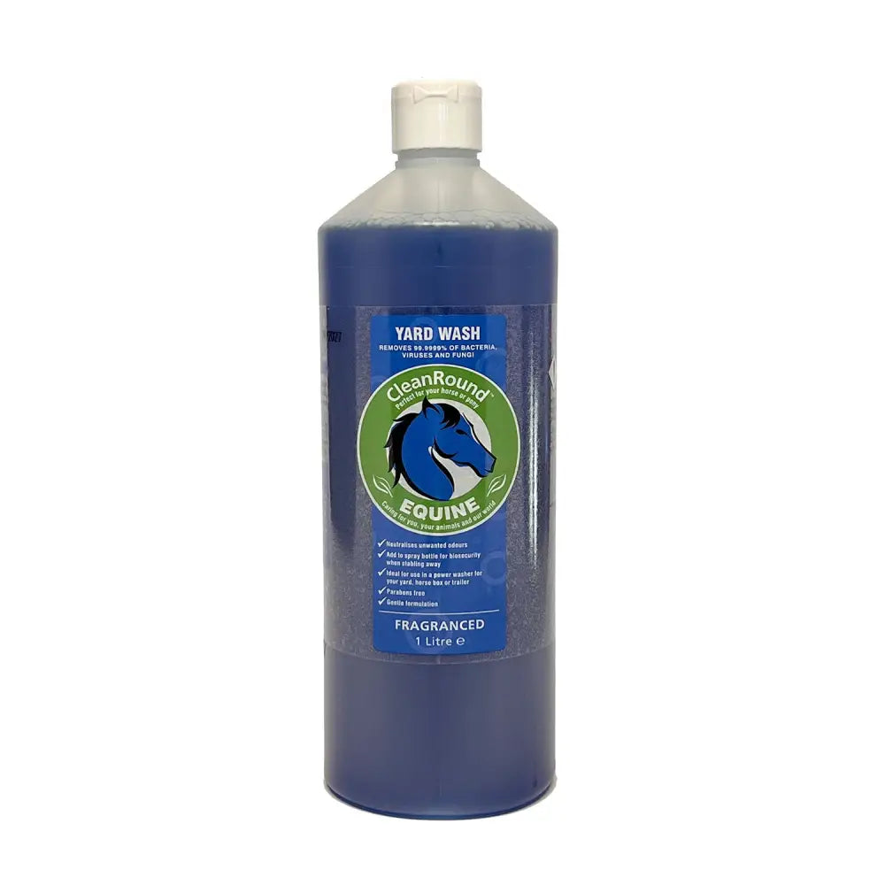Cleanround fragranced yard wash in a clear plastic bottle with blue liquid and green label for fresh horse yards
