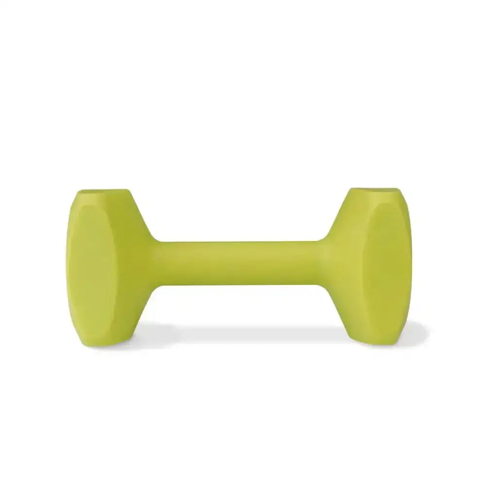A lime green hexagonal coachi training dumbbell made of rubber with a smooth matte finish for classic retrieval and long distance throwing