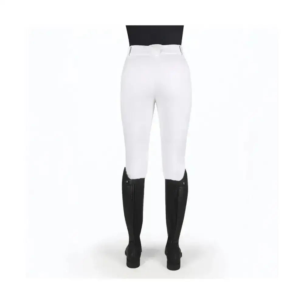 White coldstream balmore thermal riding tights with smooth brushed fleece material and black knee-high boots