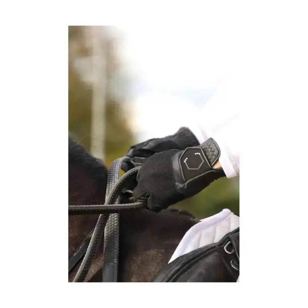 Black equestrian glove with textured reinforced palm and adjustable wrist strap with hexagonal patch from generation blakelaw diamante