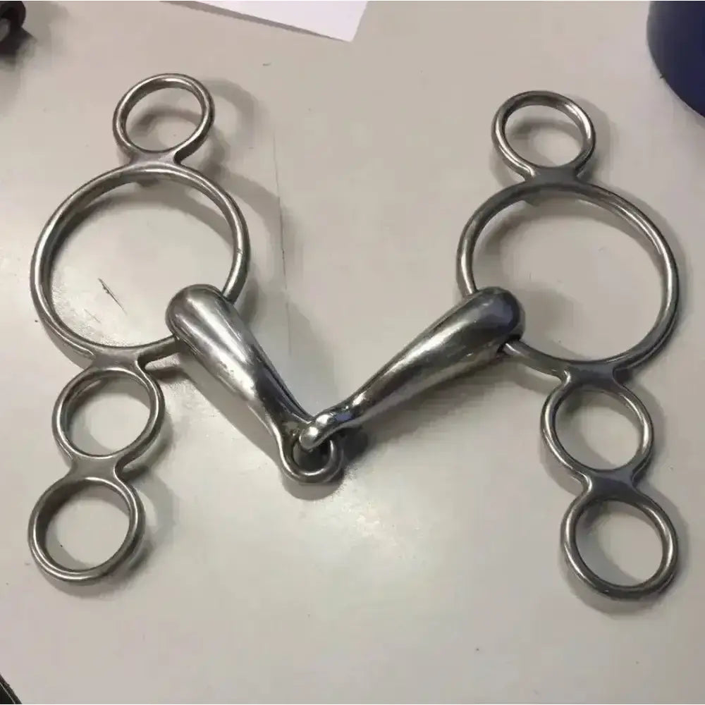 Silver stainless steel ring jointed dutch gag bit with central mouthpiece and multiple rings on each side shop soiled