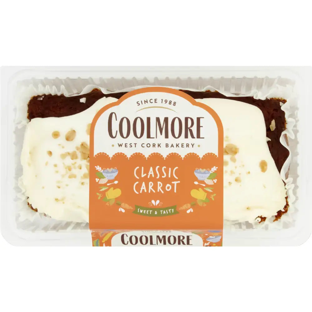 A coolmore classic carrot cake with moist brown base cream cheese frosting and chopped nuts topping from coolmore bakery