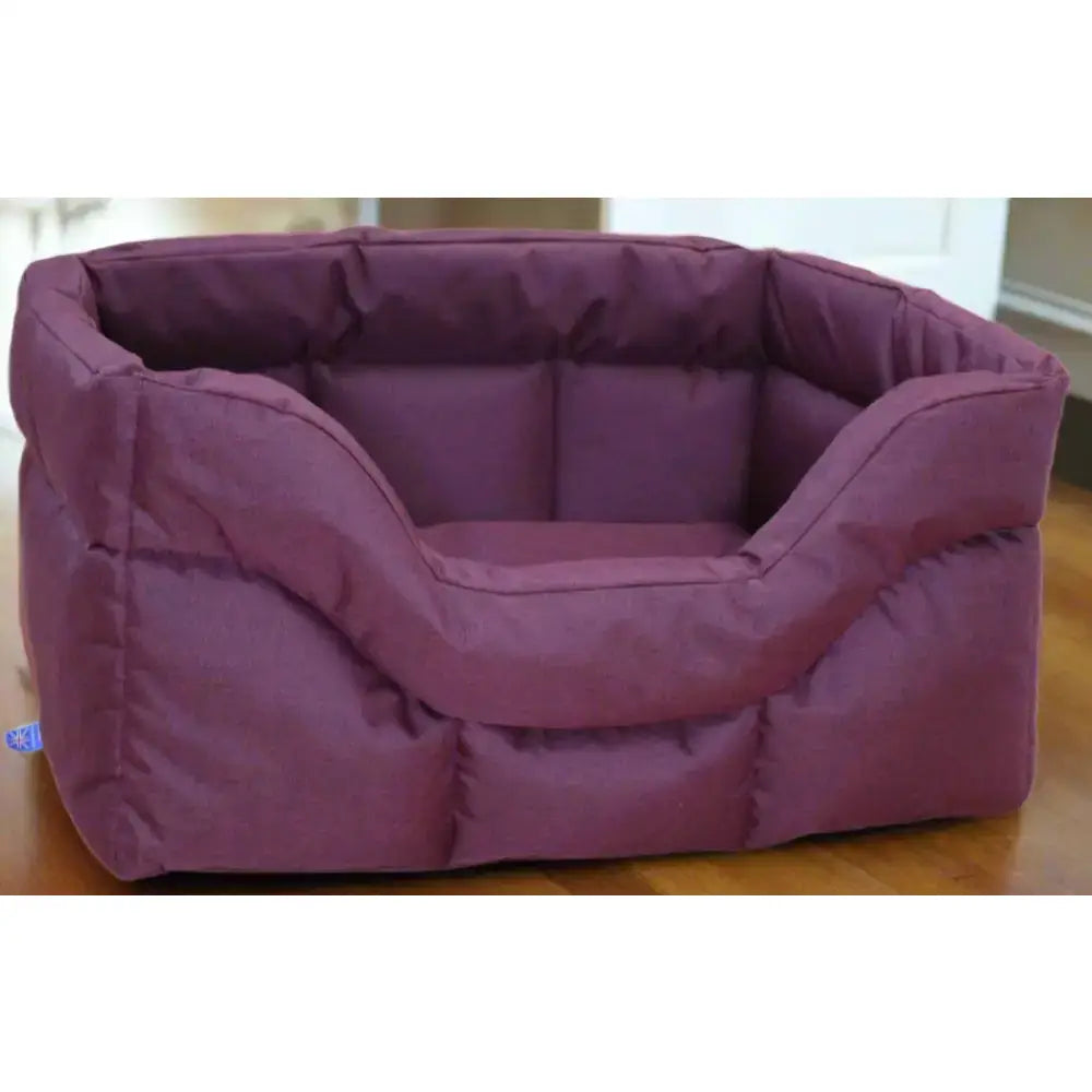 Purple quilted heavy duty rectangular high sided waterproof dog bed with soft cushioned interior and reinforced stitching