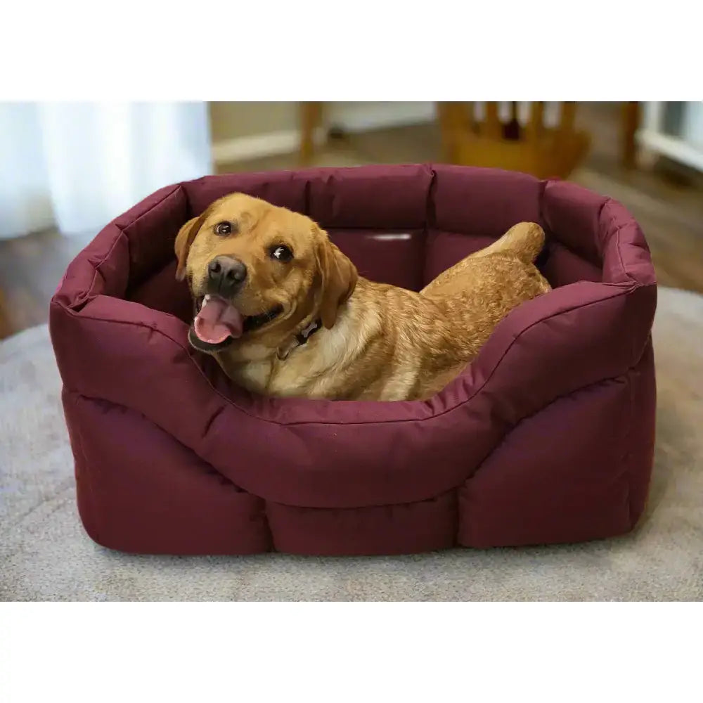 A plush deep maroon heavy duty rectangular high sided waterproof dog bed with quilted design and padded edges