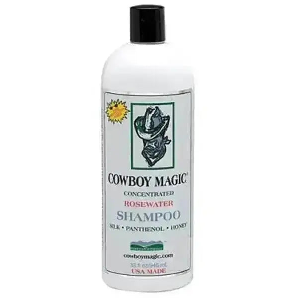 White plastic bottle of cowboy magic rosewater shampoo with black cap and cowboy hat label featuring super concentrated rosewater