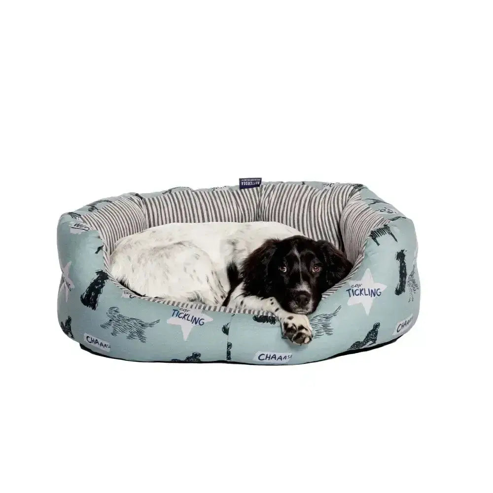 Cozy light blue danish design battersea playful dogs dogs bed deluxe with fun pattern and striped inner lining