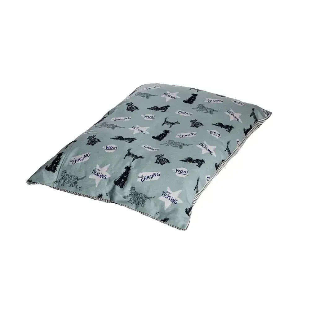 A soft light green danish design battersea playful dogs deep duvet dog bed with black dog silhouettes and white stars pattern