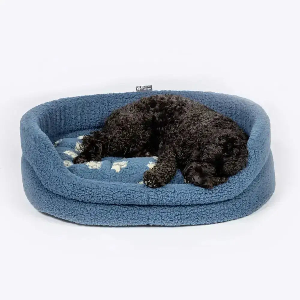 Blue plush dog bed with white stars made from harbour paw fleece by danish design harbour for cozy pup naps