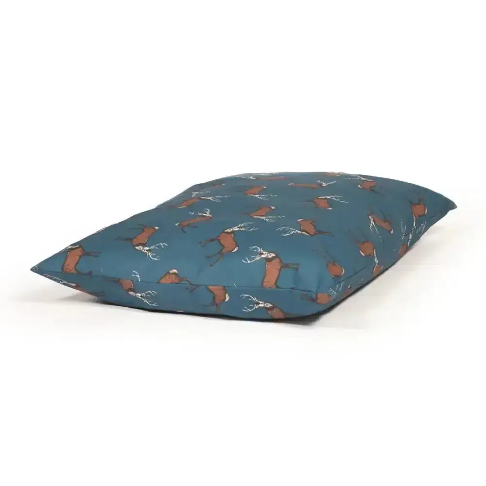 Teal cushion with brown and white deer pattern from danish design woodland stag luxury deep duvet dog bed collection