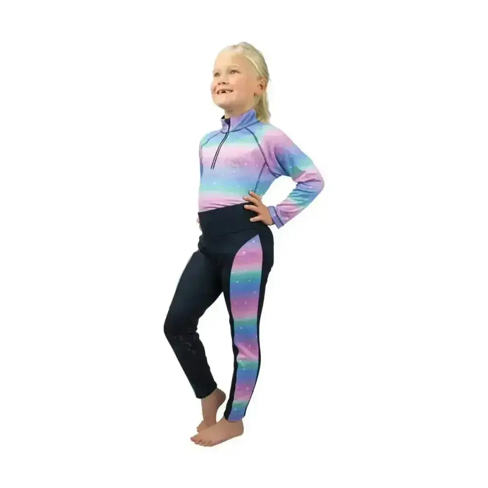A child wearing the dazzling night base funky base layer with flexible fabric rainbow gradient top and matching leggings