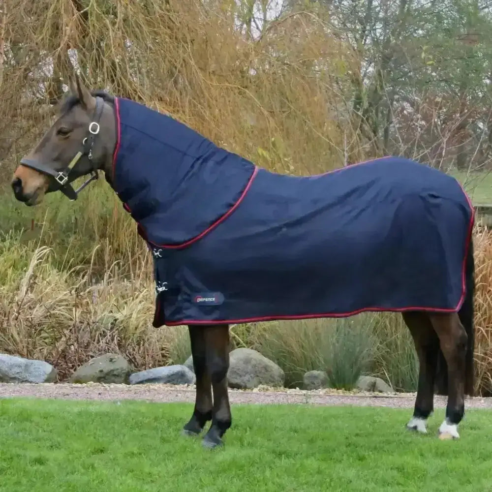 Navy blue wicx cooler rug with red trim detachable neck cover and small brand logo for horse cooling comfort