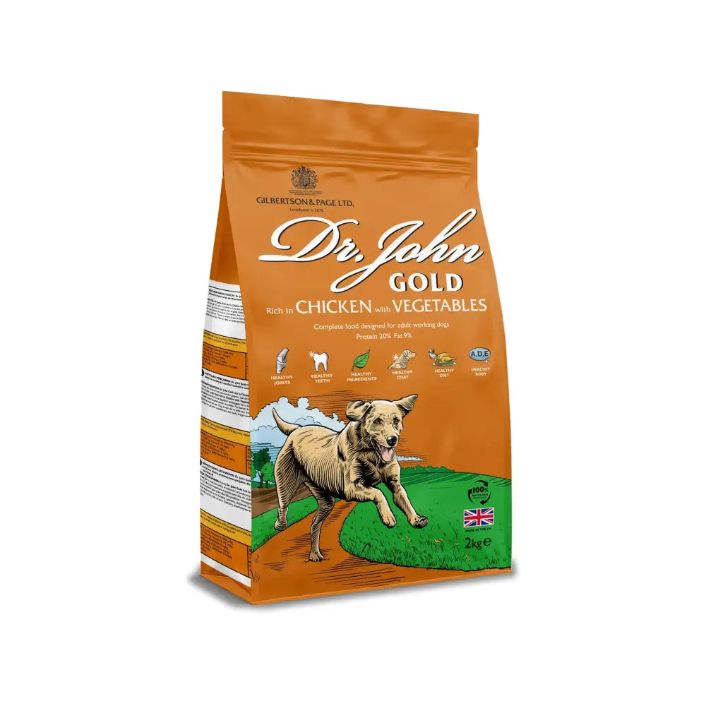 Orange and green bag of dr john gold rich balanced dog food with slow releasing carbohydrates and chicken vegetables
