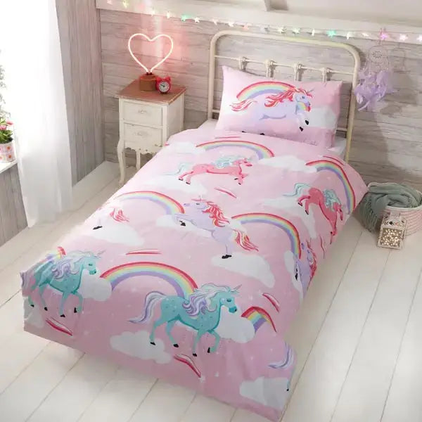 Pink unicorn duvet set with pastel unicorns rainbows and clouds on soft pink background elico unicorn duvet