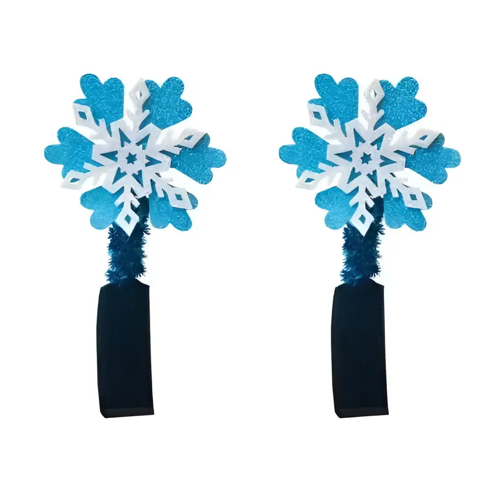 Blue glitter fjord snowflake bridle boppers with white cutout centers and fuzzy blue stems from equetech childs fjord collection