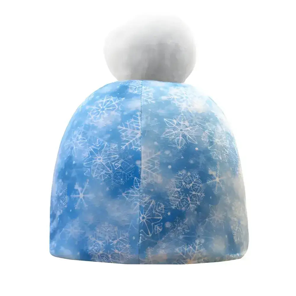 Blue childs fjord snowflake hat with white snowflake pattern and fluffy pom pom by equetech winter beanie