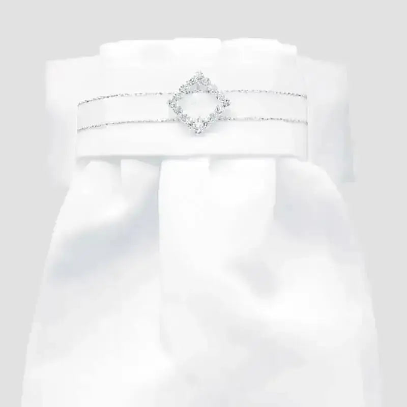 A delicate white satin belt with a sparkling silver diamante diamond buckle from equetech deluxe ready-tied stocks
