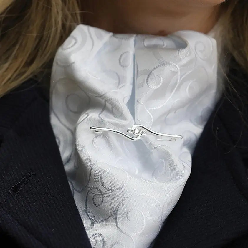 Silver-toned equetech deluxe twist stock pin with elegant curves and clear gemstone accents