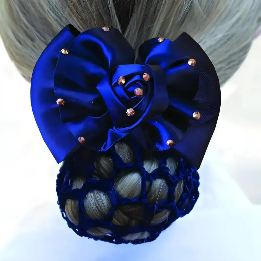 A navy blue satin equetech dressage rosette ribbon hair accessory with gold-toned rhinestones and mesh netting base