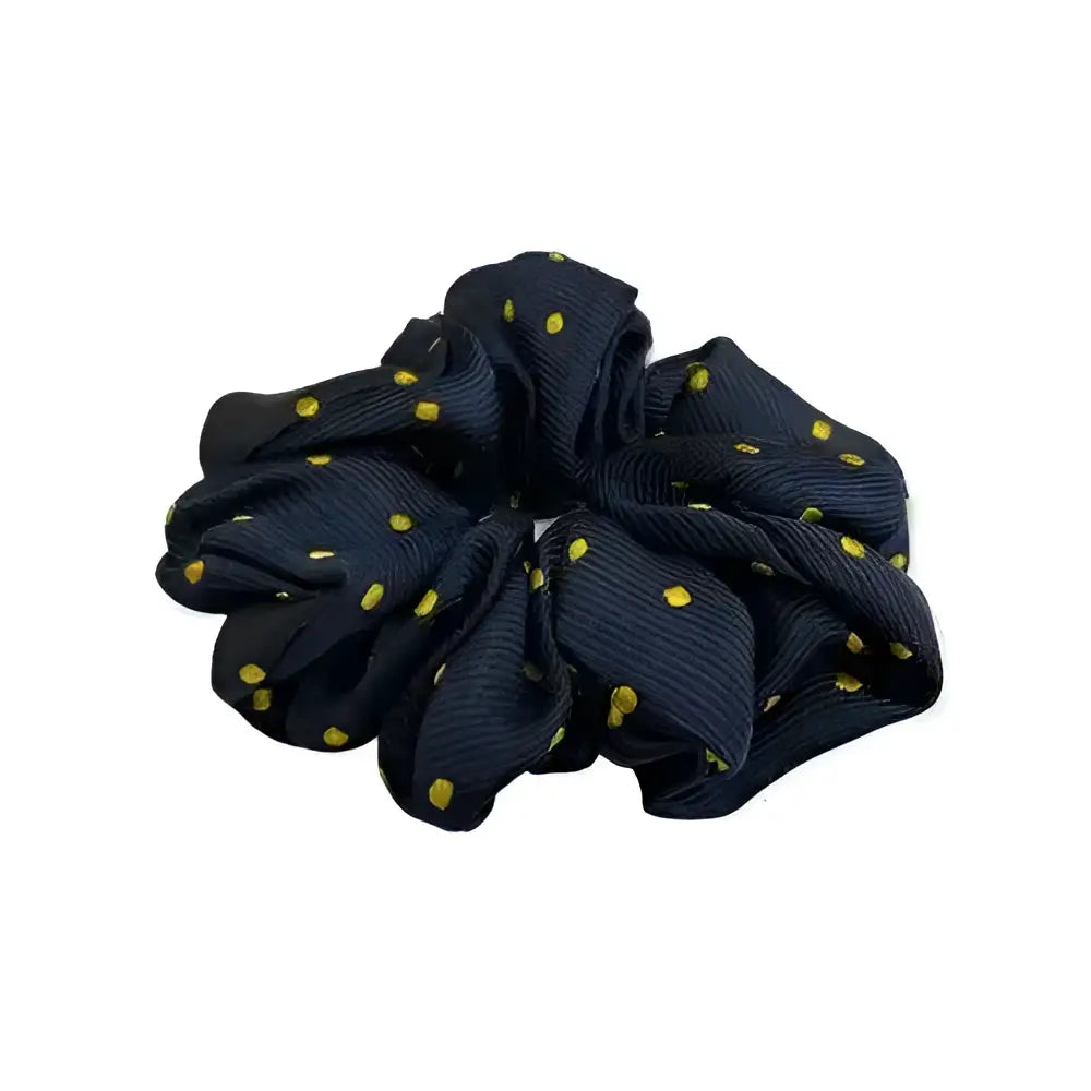 A navy blue equetech hair scrunchies polka dot fabric with small yellow dots perfect for stylish hair scrunchies polka fans