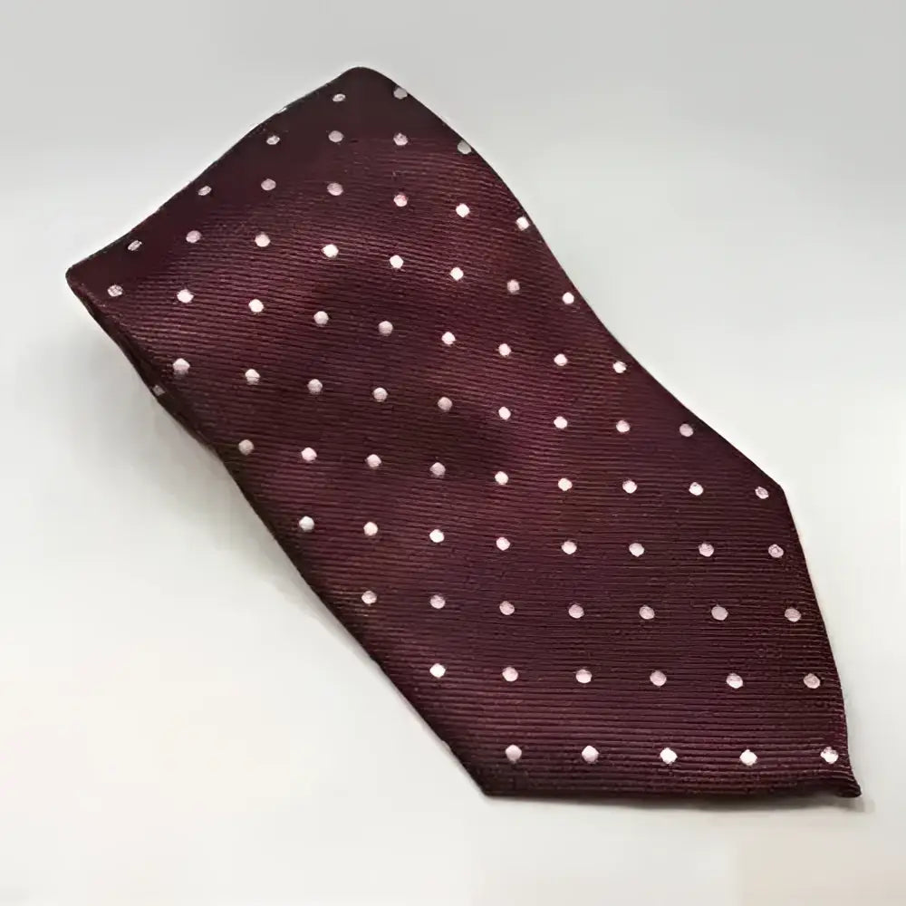 A maroon silk equetech junior polka dot tie with light pink polka dots, perfect junior polka dot ties option