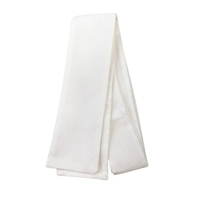 A white equetech marcella cord cotton marcella stock with subtle woven pattern and self tying design