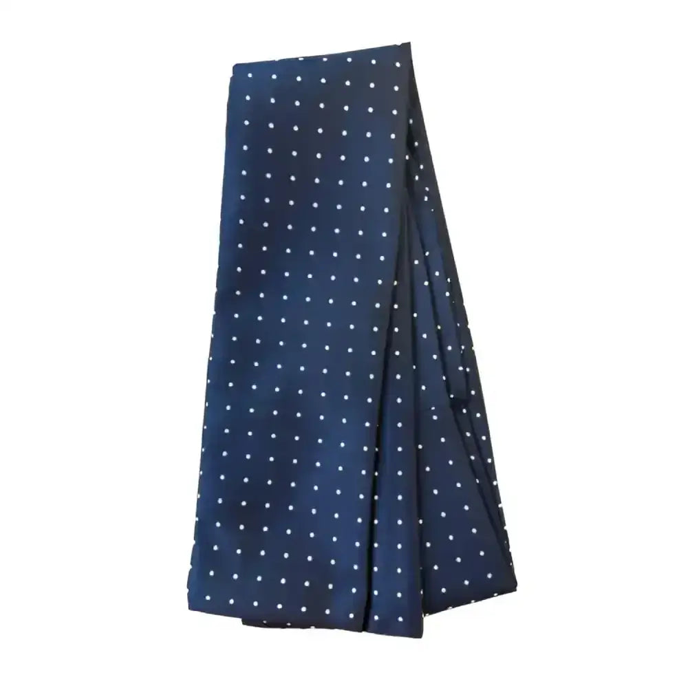 Navy blue equetech pin spot riding stock in jacquard fabric with white polka dots and self tying design