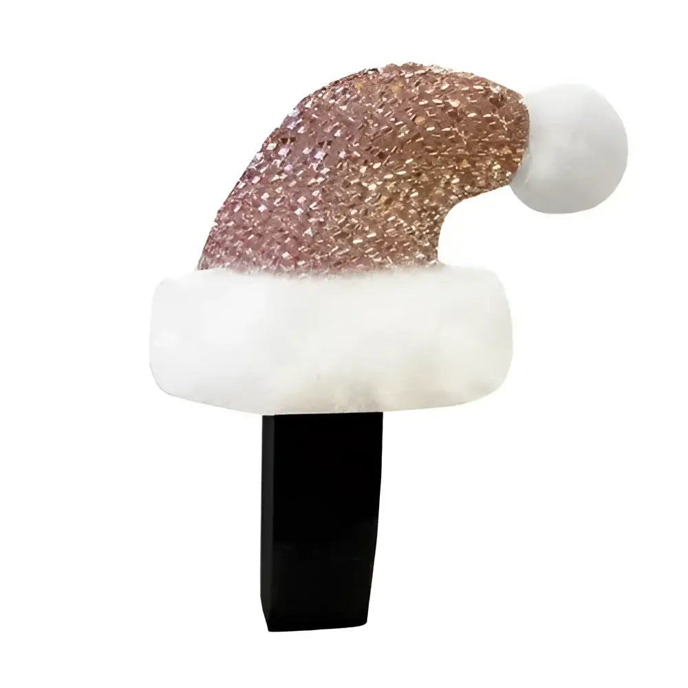 A glittery rose gold santa bridle horse hat with fluffy white trim and pom pom on a black clip by equetech santa bridle