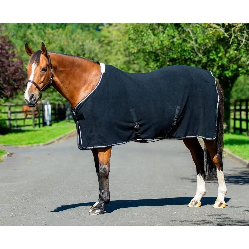 Black equi-sential fleece cooler horse blanket with white trim and adjustable straps made from quality anti-pill fleece
