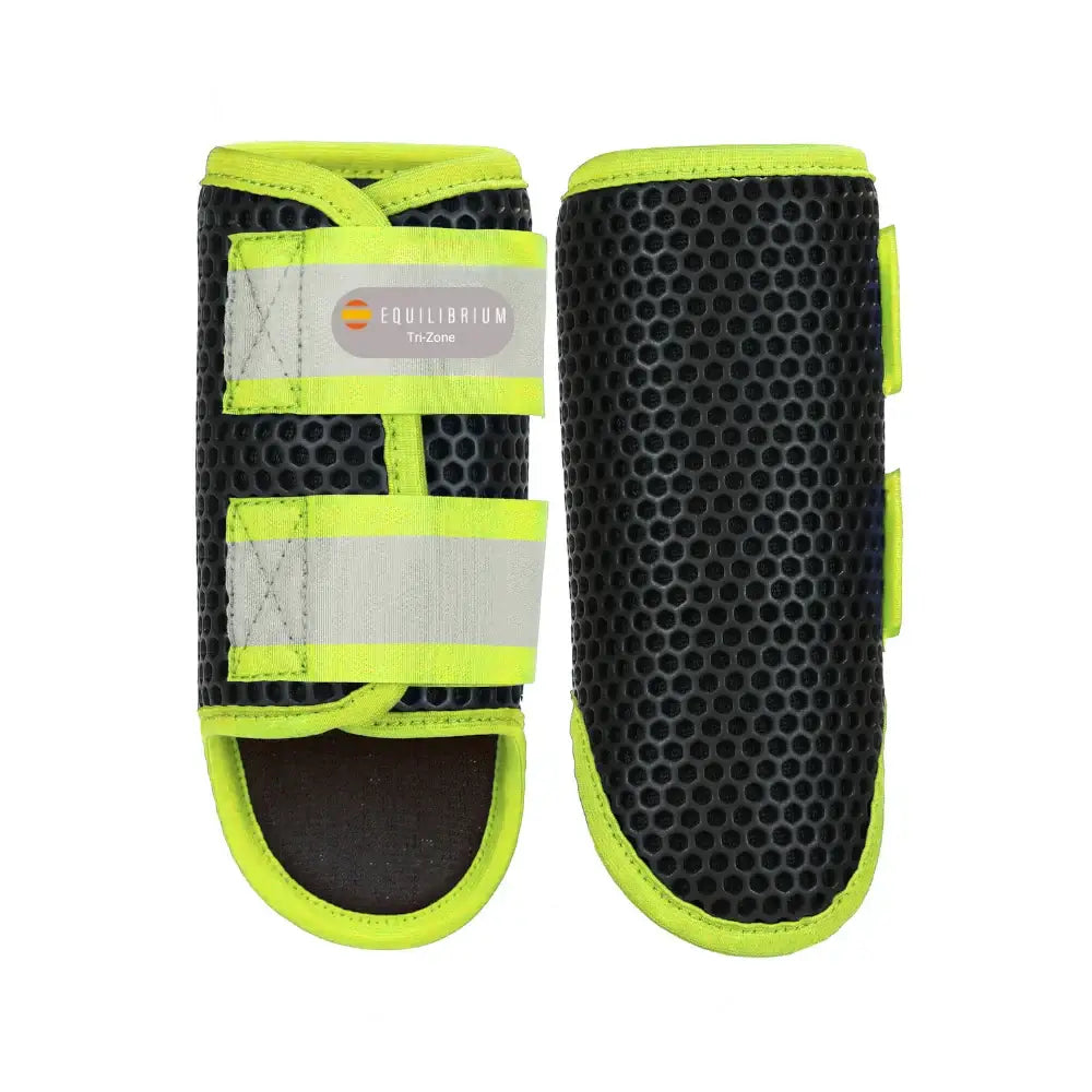 Bright neon green and black equilibrium tri-zone brushing boots with breathable mesh design for horse legs