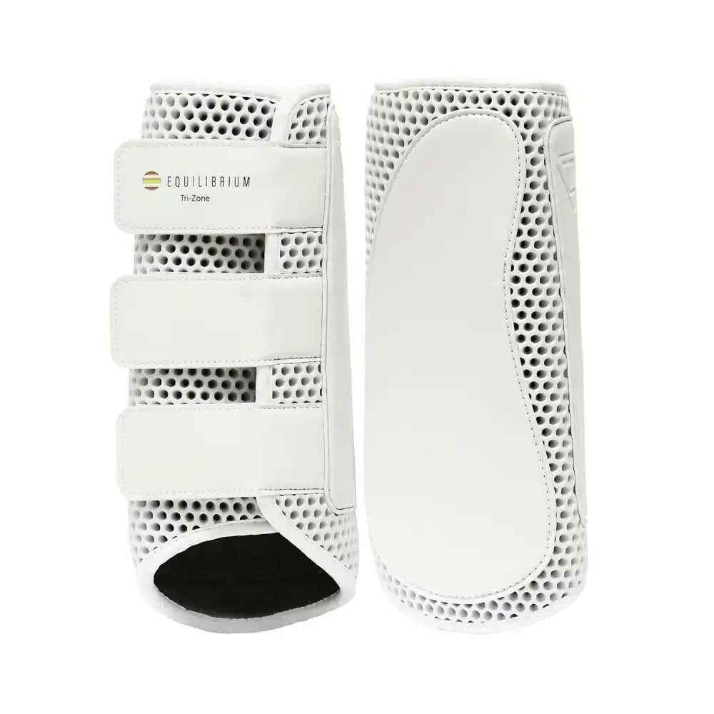 White equilibrium tri-zone impact sports boots with perforated mesh and adjustable velcro straps for cross country use