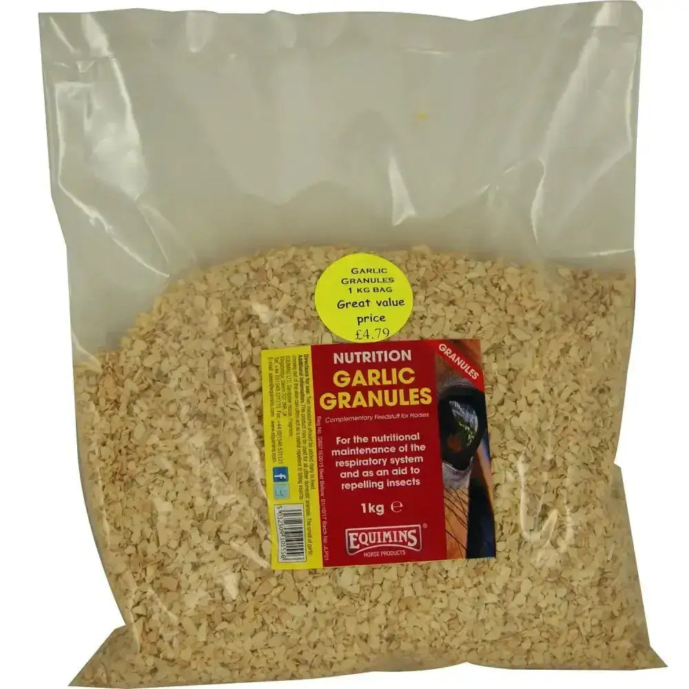 A 1kg bag of equimins garlic granules beige granular horse supplements in clear plastic packaging with red yellow label