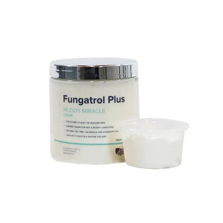 Equine america fungatrol cream in a white jar with silver lid and matching measuring cup for skin care use