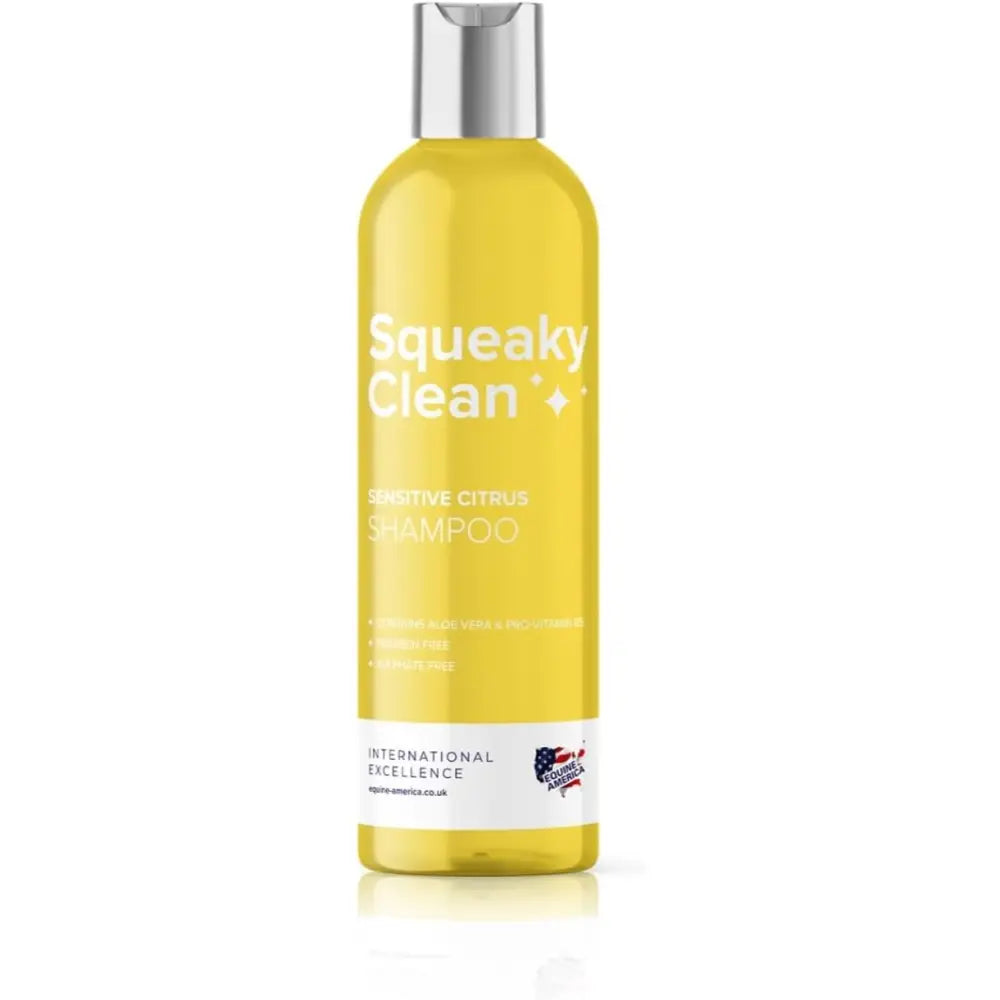 A vibrant yellow bottle of equine america squeaky clean citrus shampoo with dirt repellent action and silky mane benefits