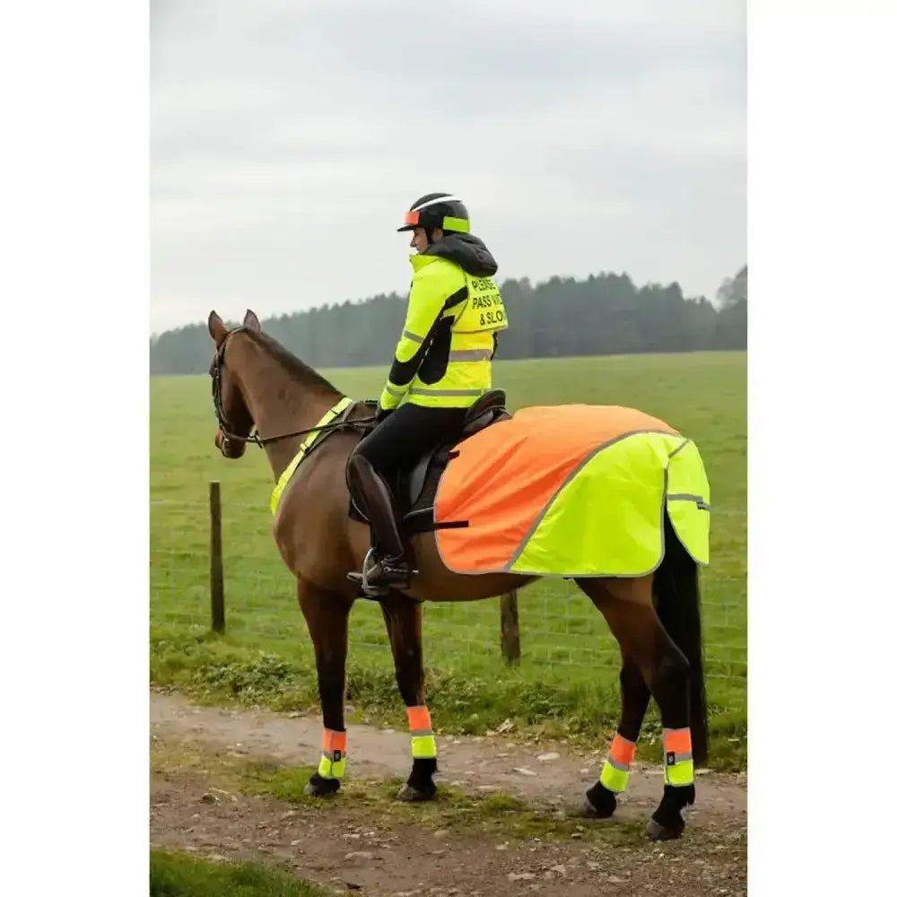 Equisafety hi-vis waterproof quarter sheet in bright orange and neon yellow with reflective strips for safety
