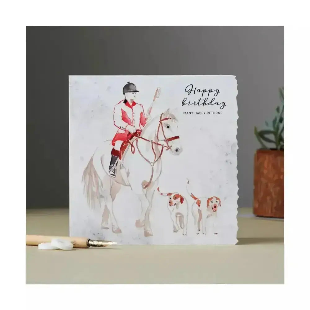 A white fanciful dolomite card with original hand-painted watercolour of a rider and dogs for happy birthday hunting