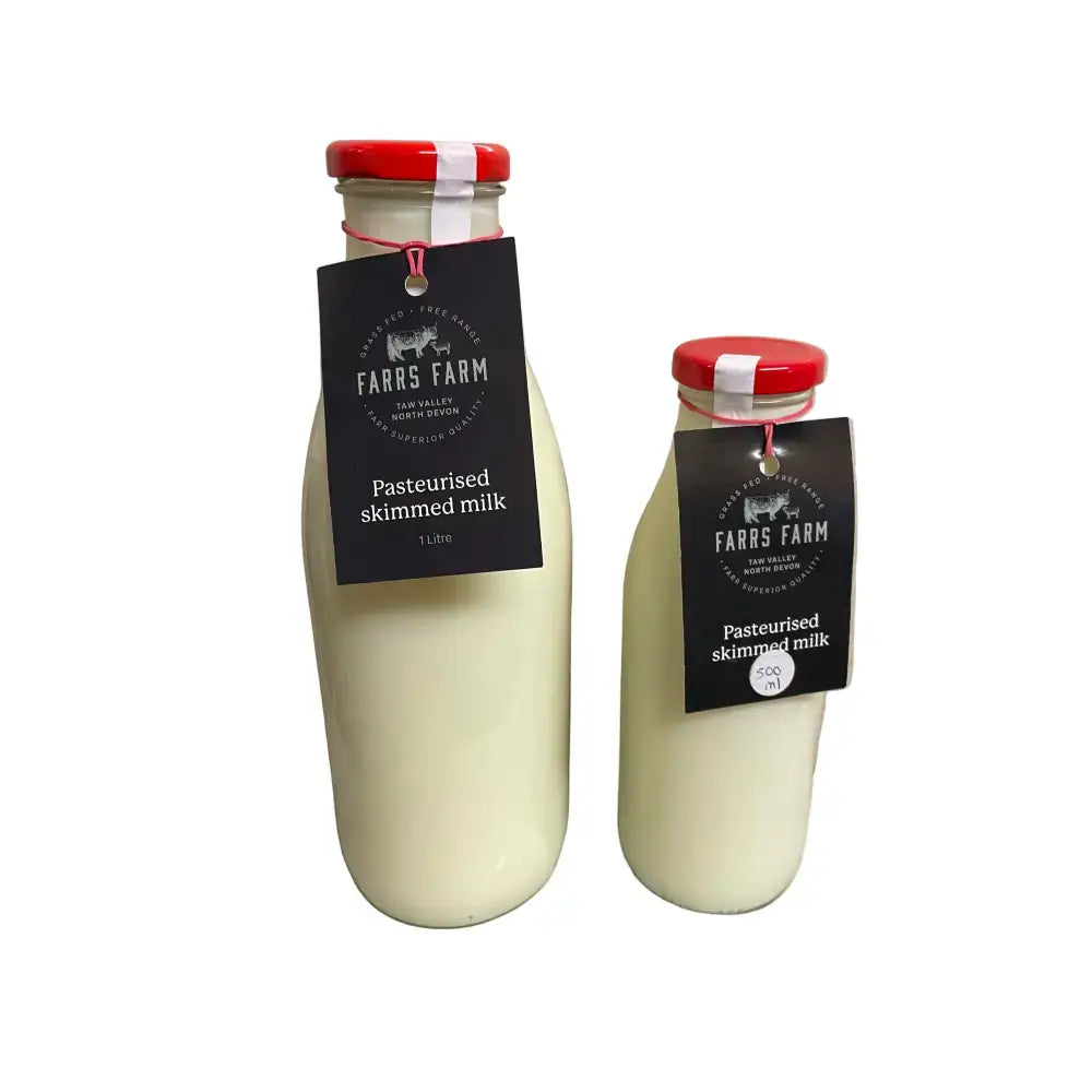 Two glass bottles of farrs farm pasteurised skimmed milk with red caps and black labels, 1 litre and 500ml sizes