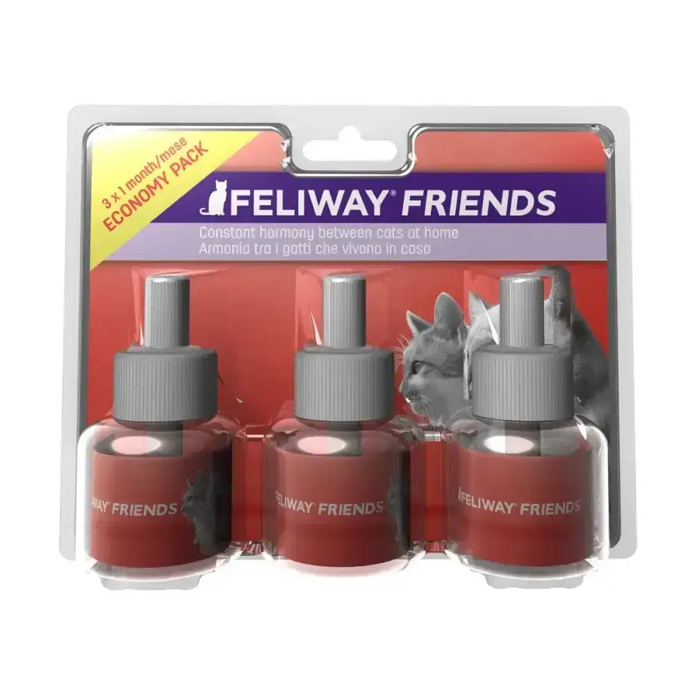 Three red feliway friends diffuser bottles in clear plastic packaging with gray caps to reduce tension in multi-cat households