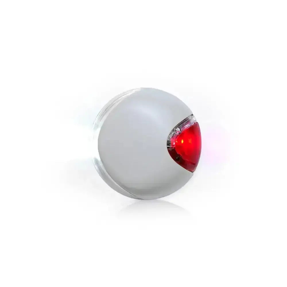 A sleek matte white spherical bicycle tail light with red led section from the flexi led lighting system light grey