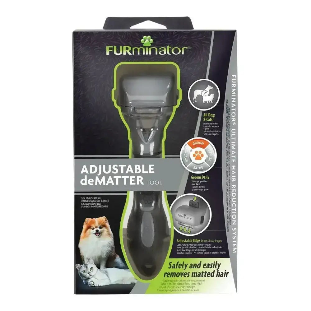 Furminator adjustable dematter tool is a sleek black and gray hand pet dematter with an ergonomic handle for safe grooming